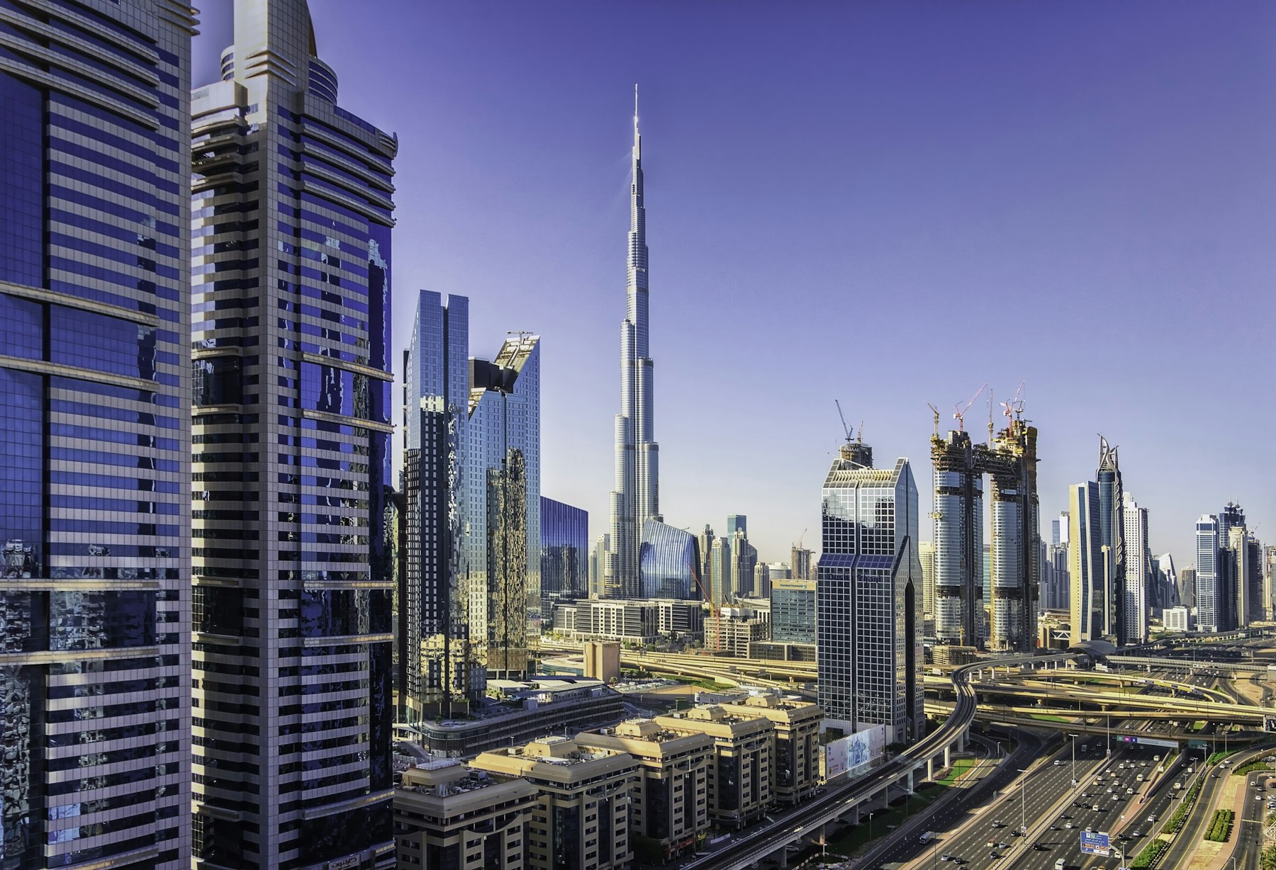 Dubai skyline with the Burj Khalifa and Sheikh Zayed Road towers