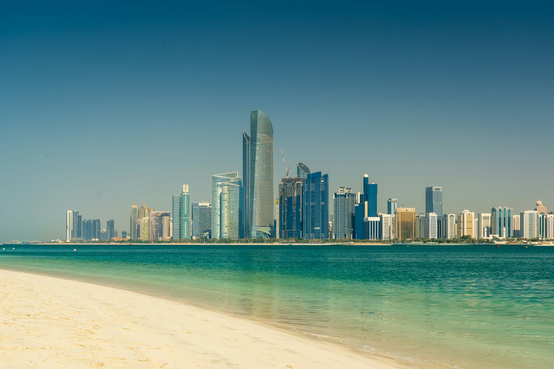 Gulf city skyline seen across the water